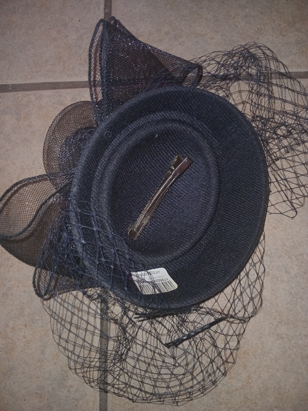 Black Veiled Cocktail Fascinator Hat with Decorative Netting